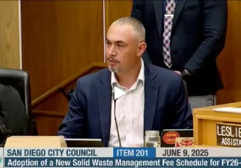 Man speaking at San Diego City Council meeting.